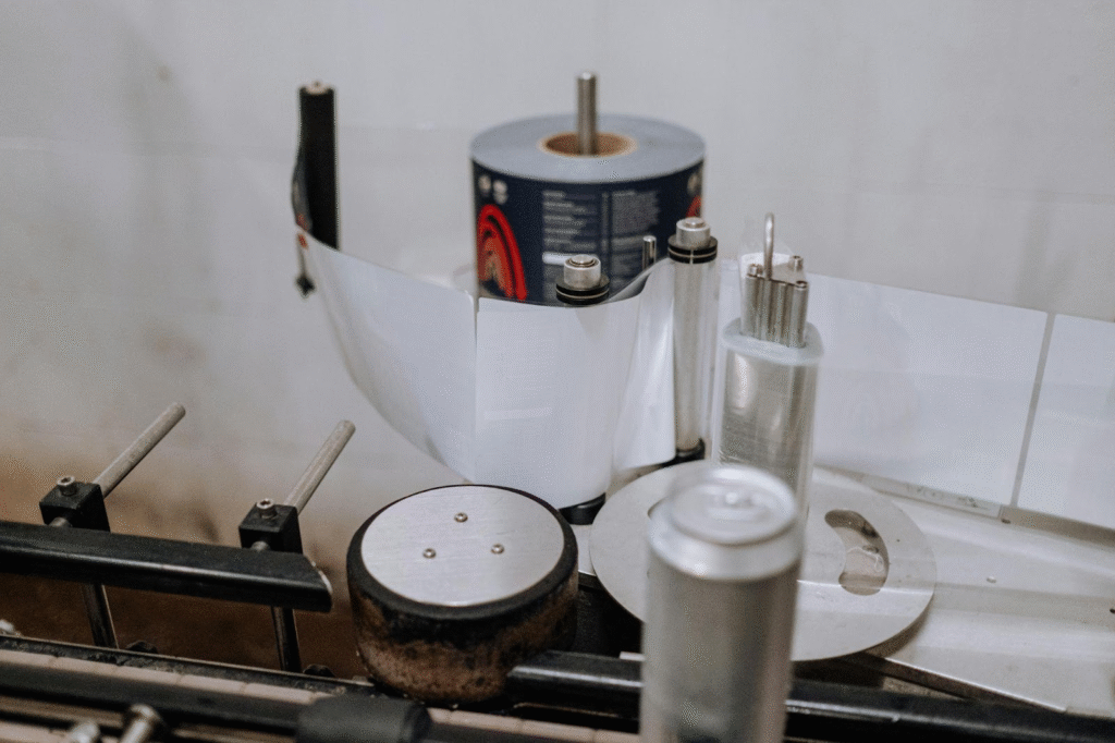 High-efficiency electric motor driving automated labeling machine in a Canadian food and beverage packaging facility.